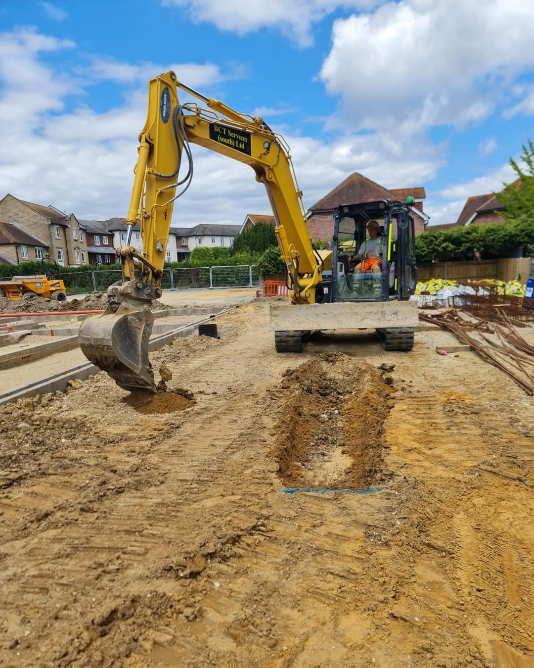 Excavator operator training on a construction site in Winchester